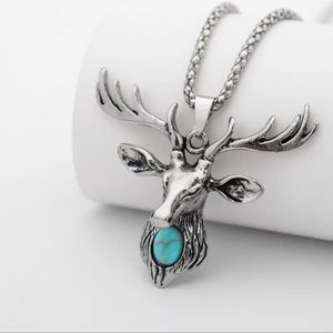 Deer head necklace. Silver tone 23.5” length chain.  Deer 1.9” by 1.6”  NWT.